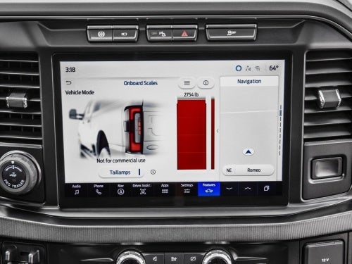 2024 Ford Super Duty close up view of touchscreen displaying onboard scales feature