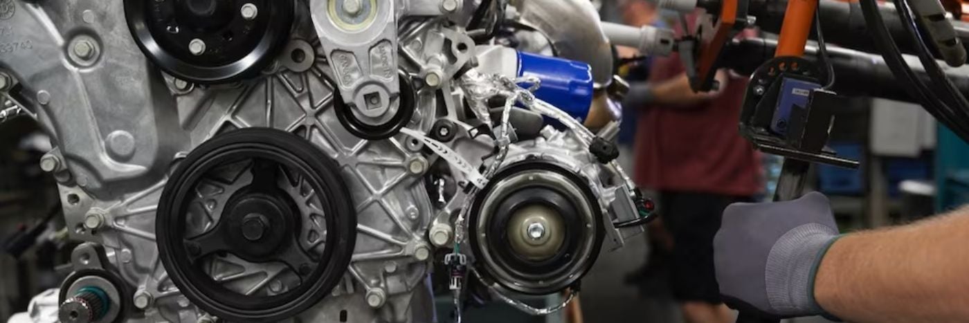 close up of engine getting serviced